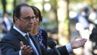 French President Francois Hollande holds a press conference after visiting a Shelter and Orientation center for migrants on September 24, 2016 in Tours. / AFP / GUILLAUME SOUVANT