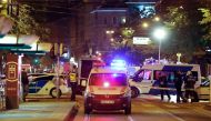 Hungarian police officials investigate in Budapest downtown as an explosion of unknown origin rocked in a building late night on September 24, 2016 injuring two passing police officers. The explosion, which was heard across large parts of the Hungarian ca