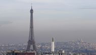 The Eiffel Tower is surrounded by a small-particle haze which hangs above the skyline in Paris, France, December 16, 2016. (REUTERS/Christian Hartmann)