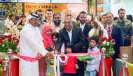 Dignitaries cutting the ribbon to inaugurate Tim Hortons Café at Ezdan Mall, Al Wakrah.