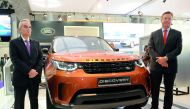 Officials with the All-New Land Rover Discovery SUV at the Qatar Motor Show. Pic: Salim Matramkot / The Peninsula