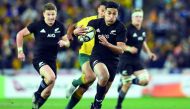 New Zealand’s wing Rieko Ioane scores a try during the Rugby Championship test match against Australia in Sydney, yesterday. 