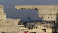 Smoke rises after Assad Regime carried out an airstrike to Arbin town of Eastern Ghouta in Damascus, Syria on February 24, 2018. Diaa Al Din - Anadolu