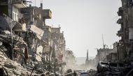 (FILES) This file photo taken on October 20, 2017 shows a general view of heavily damaged buildings in Raqa, after a Kurdish-led force expelled Islamic State (IS) group fighters from the northern Syrian city, formerly their 