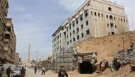 A picture taken on April 17, 2018 in the Syrian town of Douma shows an entrance to a labyrinth of tunnels under Eastern Ghouta which was use by rebel fighters, after the Syrian army declared that all anti-regime forces have left the area, following a blis