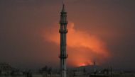 Smoke rises after military points of the 47th regiment of the Assad regime were hit on April 30, 2018 in Hama, Syria. Mahmoud Taha - Anadolu 
