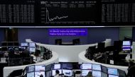 FILE PHOTO: The German share price index, DAX board, is seen at the stock exchange in Frankfurt, Germany, March 19, 2018. REUTERS/Staff/Remote
