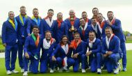 Team Europe players and captain Thomas Bjorn hold the trophy as they celebrate after winning the Ryder Cup.Reuters/Paul Childs 