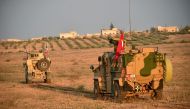 Turkish and U.S. troops are pictured during a joint patrol in Manbij area, northern Syria November 8, 2018. Turkish Defence Ministry/Turkish Military