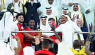 Amir H H Sheikh Tamim bin Hamad Al Thani yesterday crowned Al Duhail club, winners of H H the Amir Football Cup, after they beat Al Sadd 4-1 in the final match held at Al Janoub Stadium. 