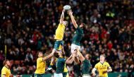 Australia's Izack Rodda (L) and South Africa's Lood de Jager (R) fight for the ball during the 2019 Rugby Championship match, South Africa v Australia, at the Emirates Airline Park in Johannesburg, on July 20, 2019. / AFP / Phill Magakoe
