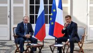 French President Emmanuel Macron meets with Russia's President Vladimir Putin, at his summer retreat of the Bregancon fortress on the Mediterranean coast, near the village of Bormes-les-Mimosas, southern France, on August 19, 2019. Gerard Julien/Pool via 