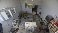 This picture taken on August 21, 2019 shows the damaged interior of an operating room following a reported air strike on a makeshift clinic in the area of Tallmannis in Syria's northern Idlib province3 / AFP / Abdulaziz KETAZ