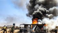 Firefighters from the Syrian Civil Defence, also known as the 