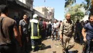 Civil defence crews and residents inspect the site of motorbike explosion killing 1, wounding 11 others in Azaz district of Aleppo, Syria on September 03, 2019. Nayef Abboud - Anadolu 