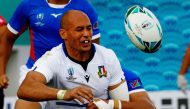 Italy's number Sergio Parisse is tackled during the Japan 2019 Rugby World Cup Pool B match between Italy and Namibia at the Hanazono Rugby Stadium in Higashiosaka on September 22, 2019. / AFP / Filippo Monteforte 