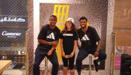 Former 100 metres world champion, Jamaica’s Yohan Blake (left) and United States’ sprinter Noah Lyles pose for a photograph with a student of Sherborne School Qatar at the Mall of Qatar in Al Rayyan, yesterday.  Picture: Armstrong Vas / The Peninsula 