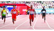 Qatar’s Owaab Barrow (centre) in action during the Men’s 100 Metres Preliminary Round at the Khalifa International Stadium in Doha, yesterday.