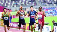 Qatar’s Abubaker Haydar Abdalla (right) crossing the finish line during the Men’s 800m heats yesterday. Picture: Abdul Basit / the Peninsula
