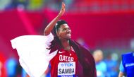 Qatar’s Abderrahman Samba celebrates after winning the bronze medal in the men’s 400 metres hurdles final on Monday. 