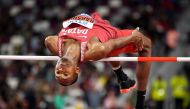 Qatar's Mutaz Essa Barshim competes in the Men's High Jump heats at the 2019 IAAF Athletics World Championships at the Khalifa International stadium in Doha on October 1, 2019. / AFP / ANDREJ ISAKOVIC