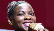 Gold medallist Uganda's Halimah Nakaayi poses on the podium during the medal ceremony for the Women's 800m at the 2019 IAAF World Athletics Championships at the Khalifa International Stadium in Doha on October 1, 2019. AFP / Mustafa Abumunes 