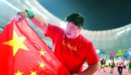 China’s Gong Lijiao celebrates after winning the women’s shot put final on Thursday.