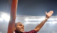  Qatar's Mutaz Essa Barshim celebrates winning gold. Reuters/Dylan Martinez