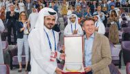 On behalf of H H the Amir, President of Qatar Olympic Committee, and Chairman of the World Athletics Championships Organising Committee, H E Sheikh Joaan bin Hamad Al Thani, receiving the IAAF Golden Order of Merit from the President of the International 