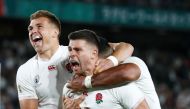 England's Ben Youngs celebrates scoring a try with teammates that is later disallowed after a TMO review. REUTERS/Edgar Su