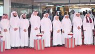 President of Kahramaa, Eng. Essa bin Hilal Al Kuwari (centre), and other officials attending celebrations of Qatar National Day at Kahramaa Tower, yesterday. Pic: Baher Amin/The Peninsula