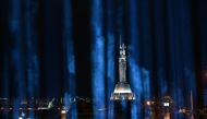 This picture shows the Motherland monument lit up in the Ukrainian capital of Kiev during the lighting protest 