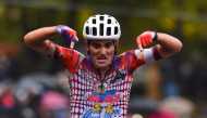 Team Education First rider Portugal's Ruben Guerreiro celebrates as he crosses the line and wins the 9th stage of the Giro d'Italia 2020 cycling race, a 208-kilometer route between San Salvo and Roccaraso on October 11, 2020. / AFP / DARIO BELINGHERI