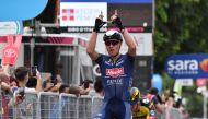 May 9, 2021 Alpecin-Fenix rider Tim Merlier of Belgium celebrates as he crosses the finish line to win the stage REUTERS/Jennifer Lorenzini