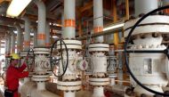 File photo: An Iranian man works on an oil production platform at the Soroush oil fields in the Persian Gulf, south of the capital Tehran, July 25, 2005. Reuters/File Photo