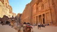 Tourists gather in front of the treasury site in the ancient city of Petra, Jordan July 2, 2021. Picture taken July 2, 2021. REUTERS/Muath Freij