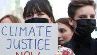 :Climate activist Anuna De Wever takes part among others in a Climate March ahead of the COP26 climate summit, in Brussels, Belgium October 10, 2021. REUTERS/Yves Herman