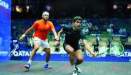 Egypt's Youssef Ibrahim plays a shot against compatriot Mohamed ElShorbagy during their second round match of the Qatar QTerminal Classic at the Khalifa International Tennis and Squash Complex, yesterday.