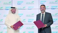 Mowasalat (Karwa) CAO Ahmed Al Muftah (left); and Mazen Raad, Chief Innovation Officer, SAP Middle East South, exchanging documents after signing the MoU.