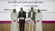 Ashghal  officials and honourees during the ceremony.