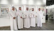 Officials unveiling the official stamp for the FIFA Arab Cup Qatar 2021 at an event held at Arab Postal Stamp Museum hall of Katara. 