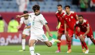  Iraqi Abdulkareem scores their first goal from the penalty spot.