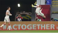 Caio Canedo celebrates after scoring United Arab Emirates’ first goal against Syria at Stadium 974, yesterday.