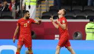 Syria’s Oliver Kass Kawo celebrates scoring their first goal against Tunisia at Al Bayt Stadium.