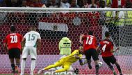 Egypt’s Amr El Soulia scores from the penalty spot.