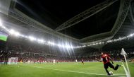 Egypt’s Amr El Soulia takes a corner kick during the match against Algeria at Al Janoub Stadium on December 7.
