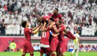 Qatar players celebrate after Boualem Khoukhi scored their third goal against the United Arab Emirates during their FIFA Arab Cup 2021 match at Al Bayt Stadium. Almoez Ali (28, 45'+3'), Boualem Khoukhi (36') and Abdulaziz Hatem (44') scored for Qatar following an own goal (6’). Pic: Abdul Basit