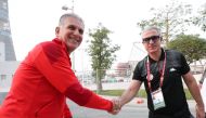 Egypt coach Carlos Queiroz (left) shakes hands with Tunisia coach Mondher El Kabir after a press conference yesterday.