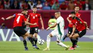 Algeria’s Sofiane Bendebka in action with Egypt’s Amr El Soulia during their Group D match at Al Janoub Stadium on December 7.