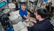 David Saint-Jacques has his blood drawn aboard the International Space Station in this undated handout photo obtained by Reuters on January 14, 2022. NASA/Handout via REUTERS